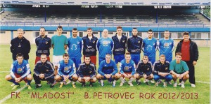 FK Mladosť na jar 2013: tréner Karakaš, M. Grujić, Novaković, Ardalić, Latinović, Zbućnović, Pavkov, Zorić, Kobilarov, Vrgović, technický vedúci Torbica (stoja zľava); Šeguljinac, Sladojević, Milovanović, Torbica, Trišić, Fábry, Krivák, Leňa, S. Grujić (kľačia zľava) 